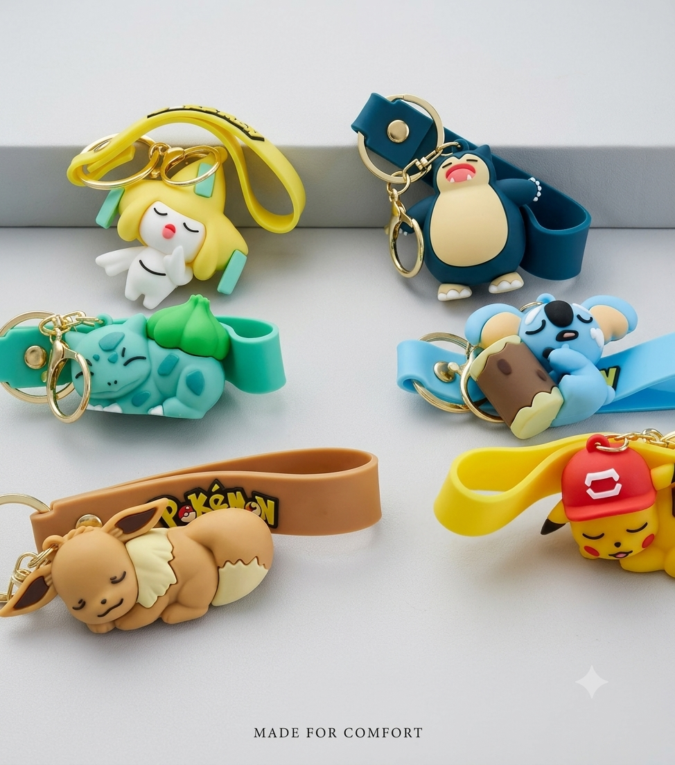 Sleeping Pikachu with cap keychain featuring cozy Pokémon companions with matching wrist strap and gold carabiner clip