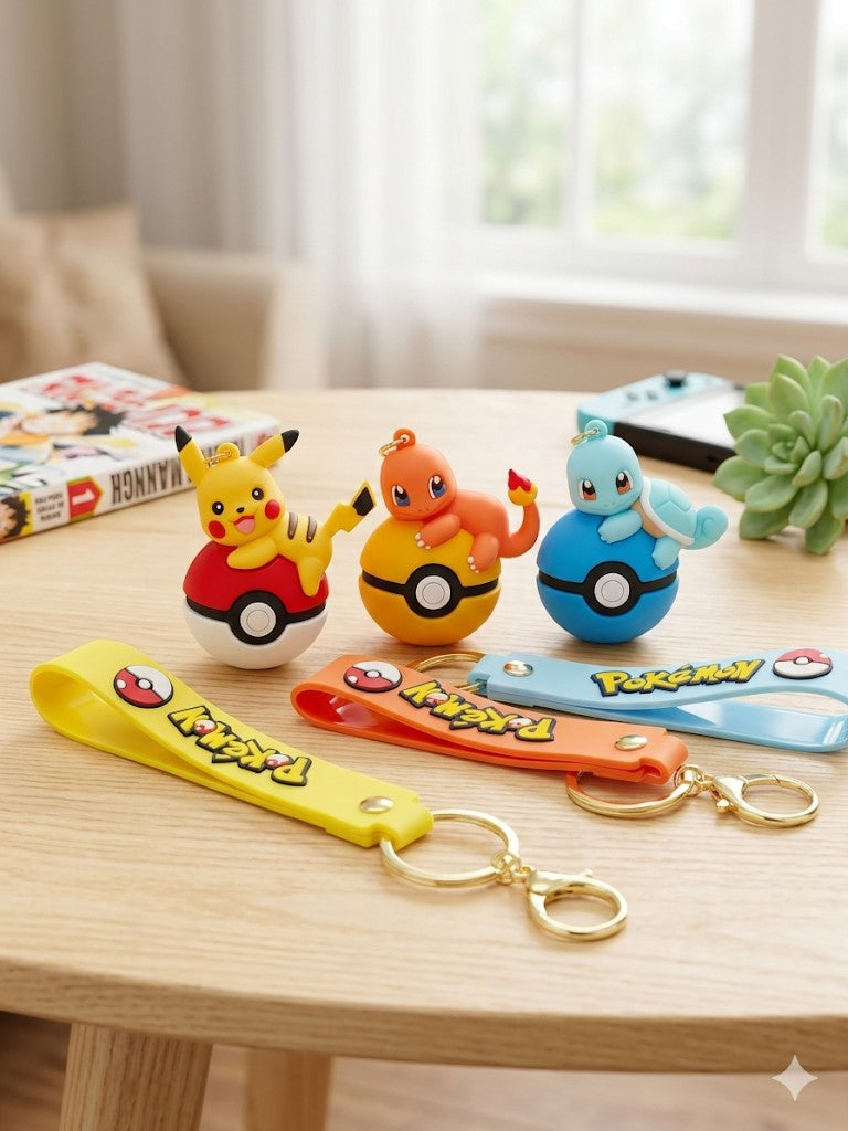 Collection of colorful 3D Pokémon Pokéball keychains featuring Pikachu, Bulbasaur, Charmander, Squirtle, Eevee, and Psyduck with matching wrist straps