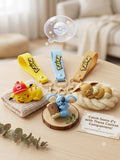 Sleeping Pikachu with red trainer cap keychain with gold carabiner and matching wrist strap